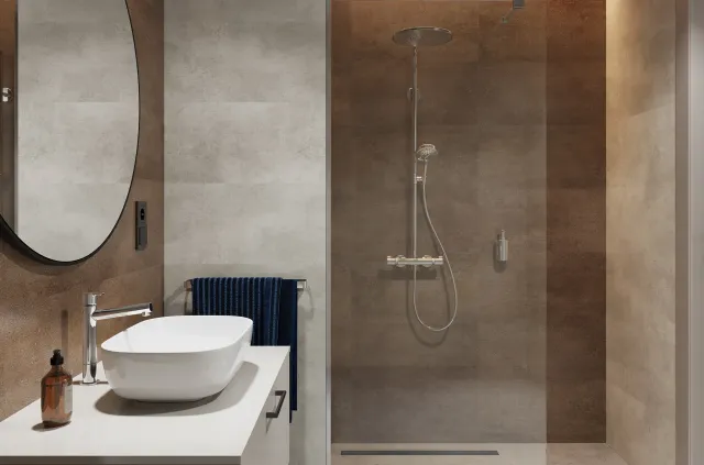 características del revestimiento pared spc concrete rusty instalado en un baño
