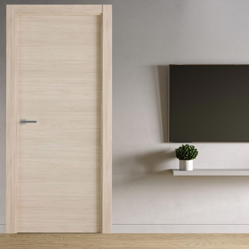 puerta laminada roble arena instalada en habitación de estilo minimalista