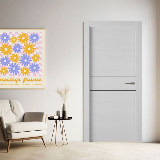 puerta laminada x2001 talcum greca negra instalada en salón moderno con sillón mesa y cuadro decorativo