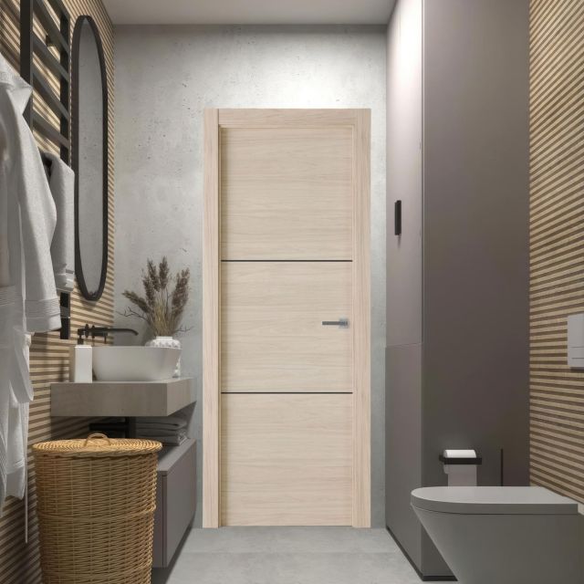 Puerta laminada X2002 Roble Arena con greca negra instalada en baño moderno de estilo minimalista.