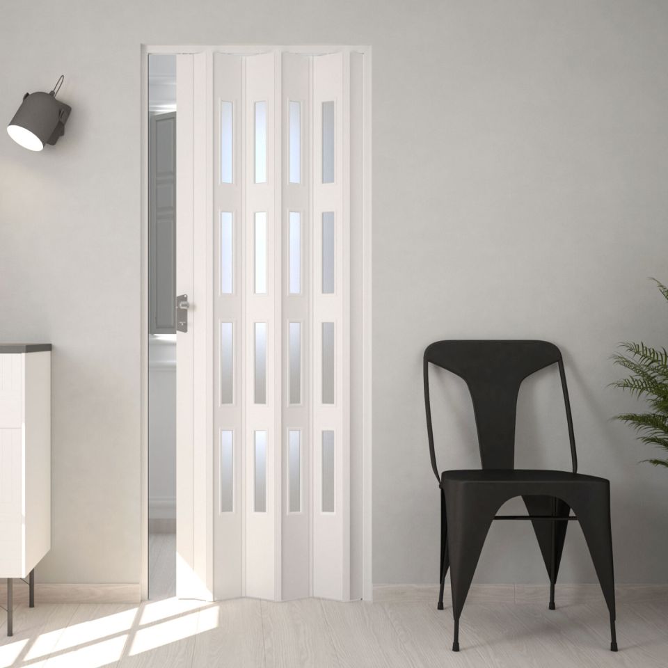 puerta plegable pvc blanca con cristal instalada en una habitacion moderna