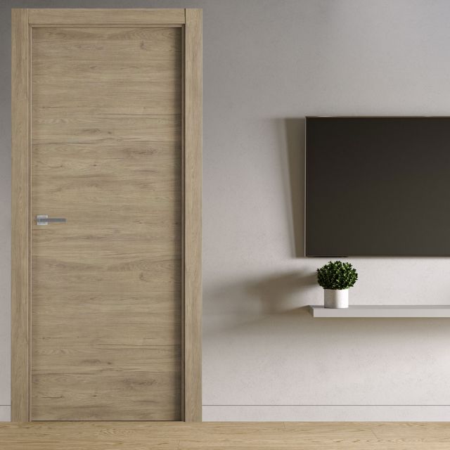 puerta laminada x1000 roble urban perciber instalada en dormitorio moderno
