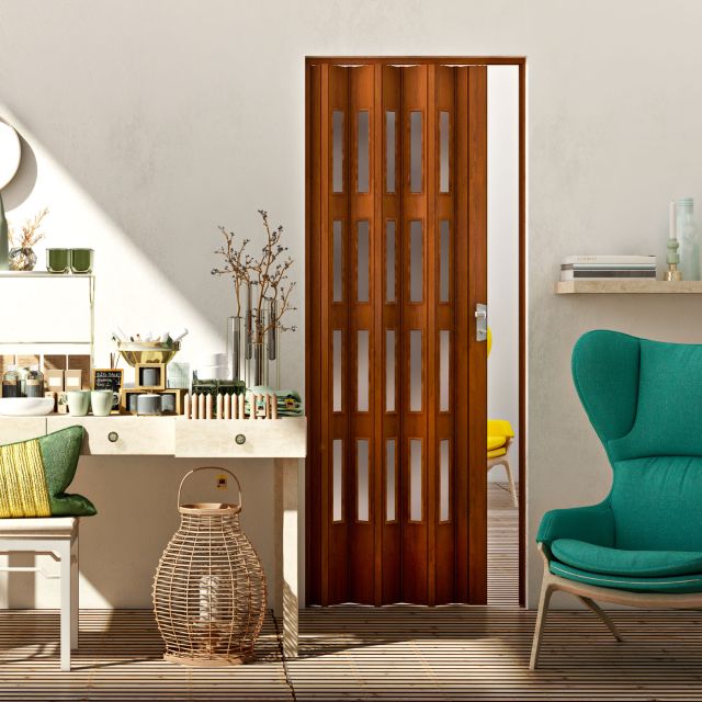 Puerta plegable pvc cerezo con cristal instalada en una habituación moderna