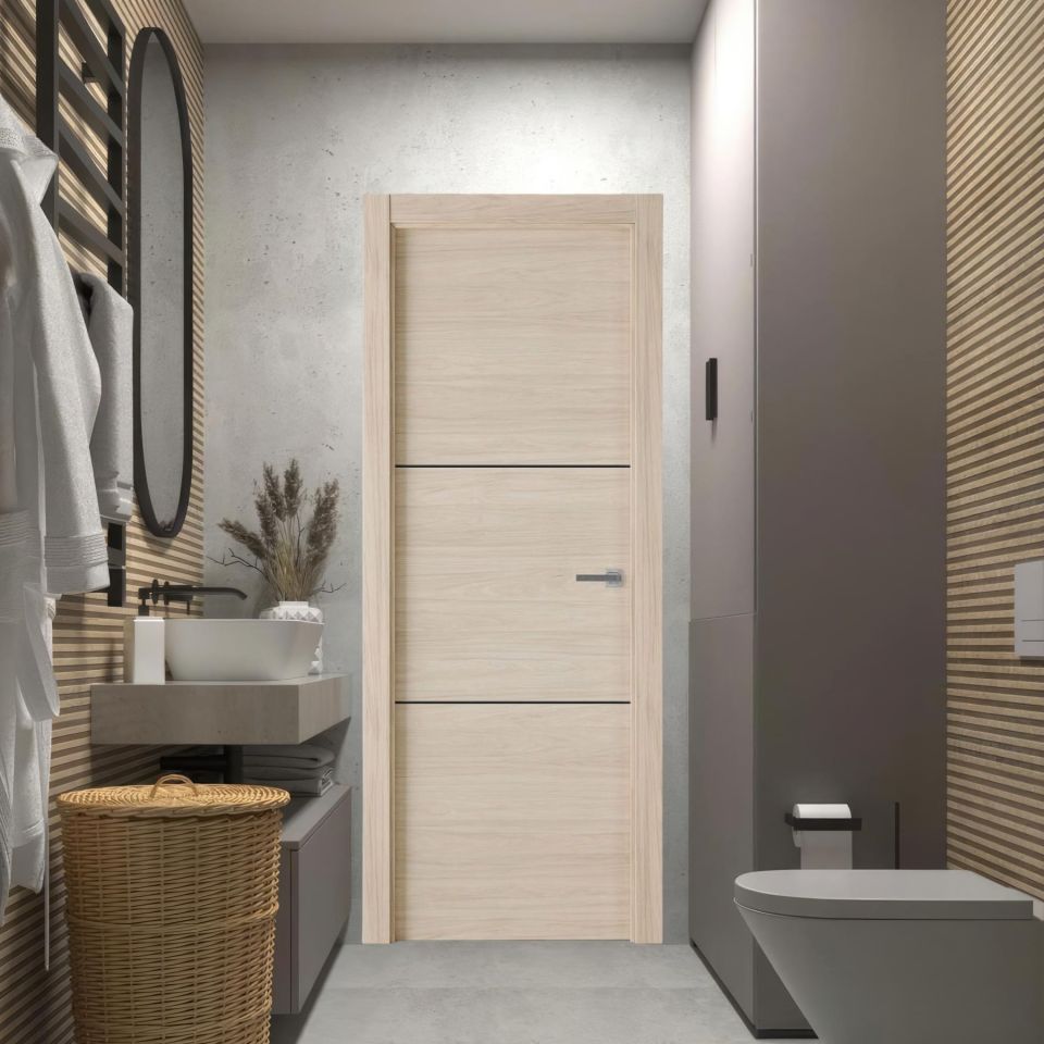 Puerta laminada X2002 Roble Arena con greca negra instalada en baño moderno de estilo minimalista.