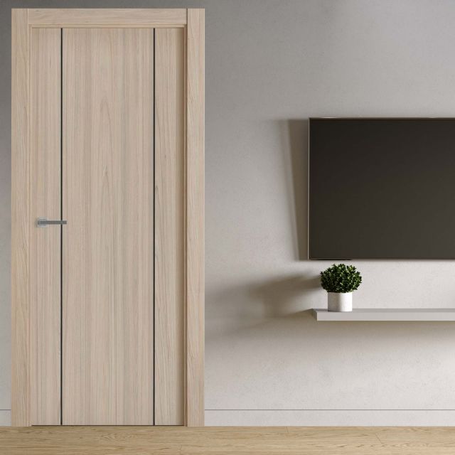 puerta laminada G1006 roble estrío greca negra instalada en salón moderno de perciber