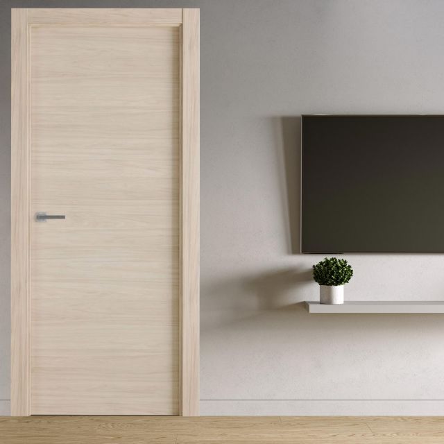 puerta laminada roble arena instalada en habitación de estilo minimalista