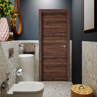 puerta laminada x2001 nogal selva con greca blanca instalada en baño moderno de estilo contemporáneo